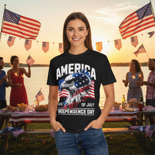 A woman wearing a black t-shirt with an eagle and a '4th of July Independence Day' design in front of an American flag.