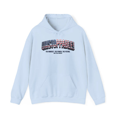 A light blue pullover hoodie with a front kangaroo pocket and a graphic on the chest reading 'UNSTOPPABLE!' in red, white, and blue block letters, with smaller text underneath, shown on a plain white background.