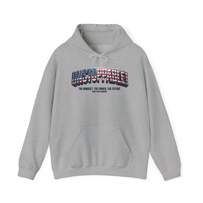 A light gray heather pullover hoodie with a drawstring hood and kangaroo pocket, featuring a large 'UNSOLOABLE' graphic across the chest in a red, white, and blue American flag pattern, with the tagline 'THE MINDSET. THE POWER. THE FUTURE. OWN YOUR MOMENT