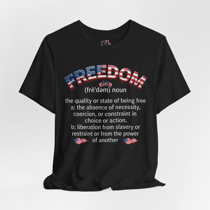 A black short-sleeve t-shirt with a graphic on the front defining the word 'FREEDOM' in a dictionary style, featuring American flag patterns and white text, shown against a white background.