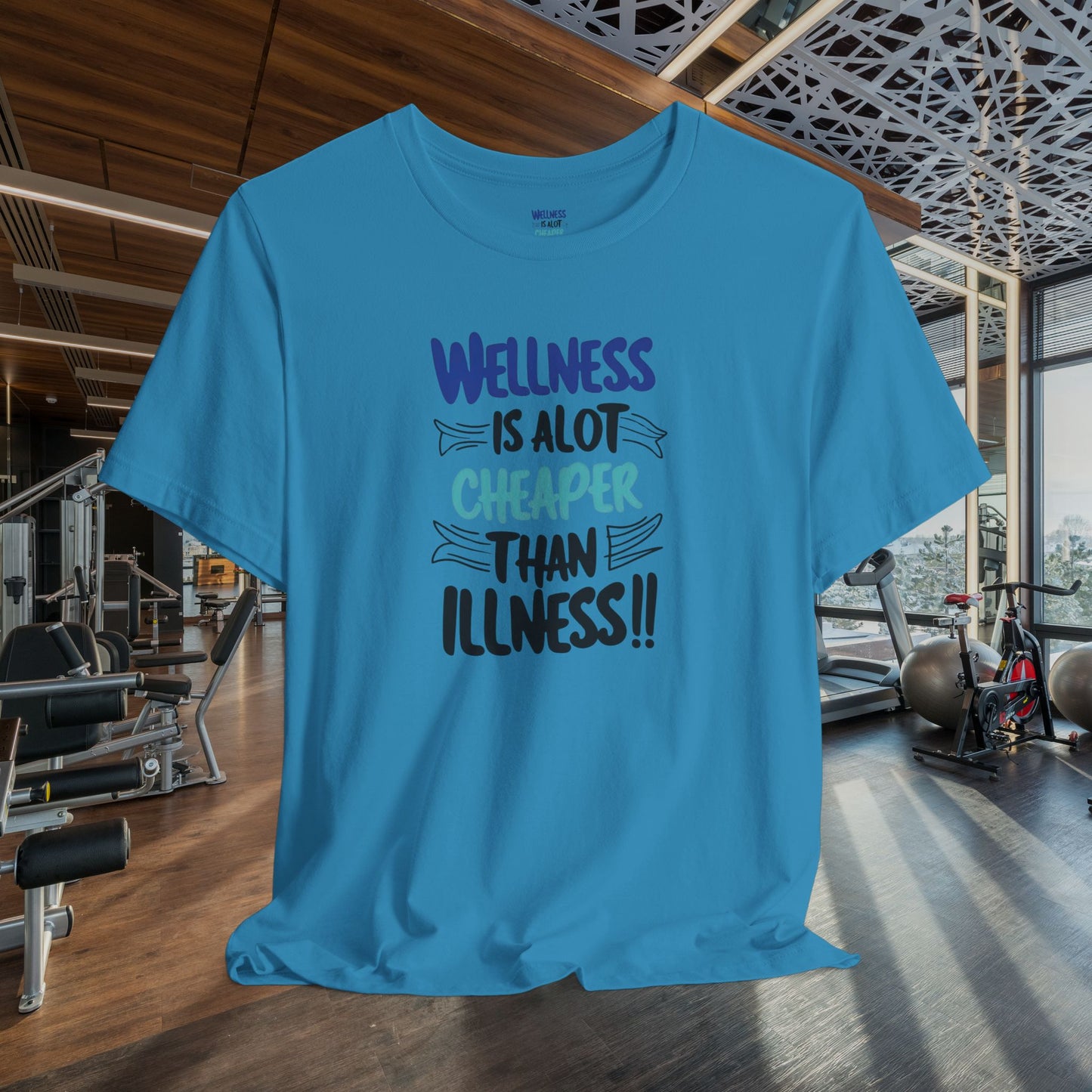Wellness Awareness Unisex Tee - Wellness Is Alot Cheaper Than Illness!! - Design - S - 3XL - Motivational Health T-Shirt for Self-Care Enthusiasts - Gift for Wellness Events - Positive Vibe Shirt -  [...]