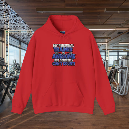 Fitness Humor Hoodie - My Personal Trainer Is Awesome But Definitely Can’t Count! Unisex Heavy Blend™ Hooded Sweatshirt - GYM Sweatshirt - Workout Apparel -