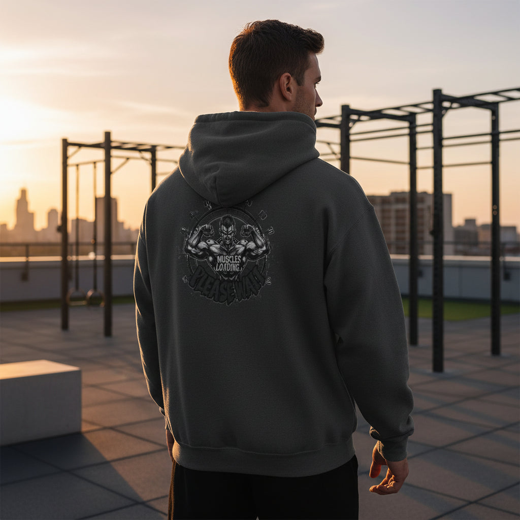 Dark gray hoodie with a graphic design on the back against a dark gray background.