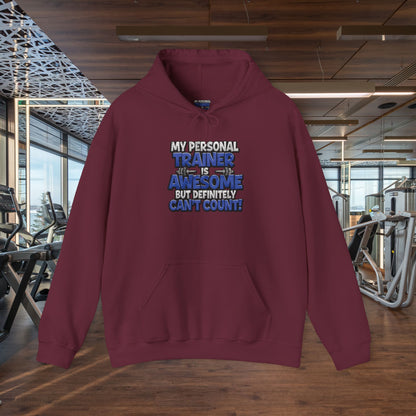 Fitness Humor Hoodie - My Personal Trainer Is Awesome But Definitely Can’t Count! Unisex Heavy Blend™ Hooded Sweatshirt - GYM Sweatshirt - Workout Apparel -