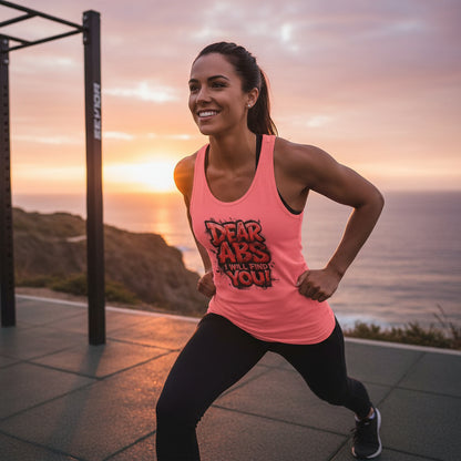 Pink tank top with 'Dear Abs I Will Find You!' text in a scenic gym setting