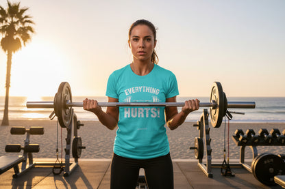 Turquoise  t-shirt with 'Everything Hurts!' GYM LIFE text with a gym beach background.