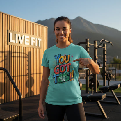 A woman wearing a t-shirt with the text 'YOU GOT THIS!!' printed in colorful letters on the front.