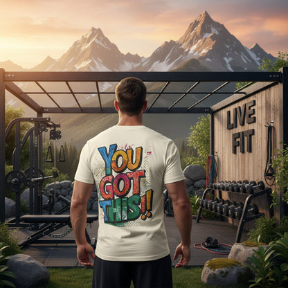 Man wearing a 'You Got This!!' t-shirt in a mountainous outdoor gym setting.