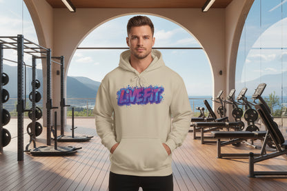 Man wearing a hoodie with 'LIVE FIT' design in a gym setting.