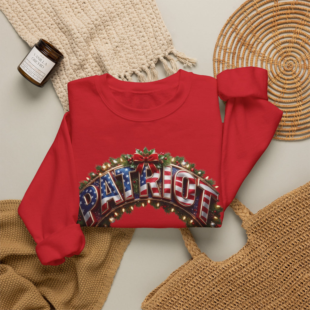 A red crewneck sweatshirt with a festive 'PATRIOT' graphic printed on the front.