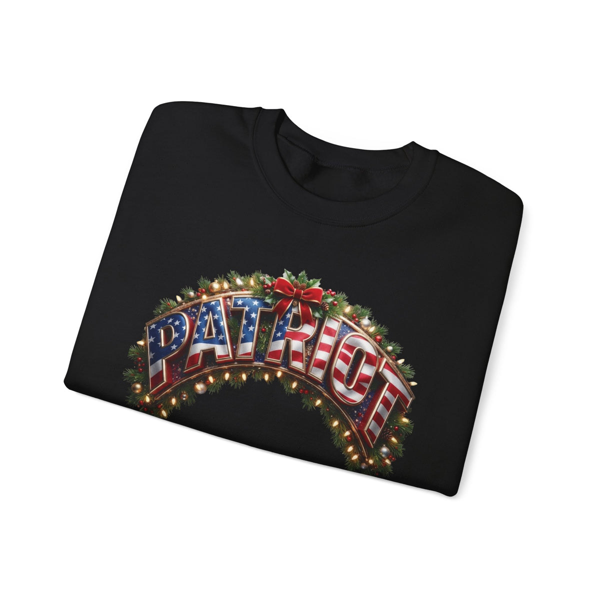A folded black crewneck sweatshirt featuring a festive graphic on the front. The graphic displays the word 'PATRIOT' in 3D block letters filled with an American flag pattern, decorated with green pine garlands, red holiday bows, and warm glowing Christmas lights, all set against a clean white background.