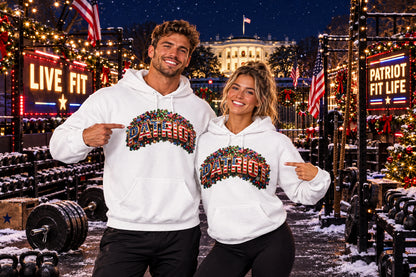 A white pullover hoodie featuring a colorful graphic on the chest that spells 'PATRIOT' in 3D block letters filled with a multicolor American flag pattern, set against a plain white background.