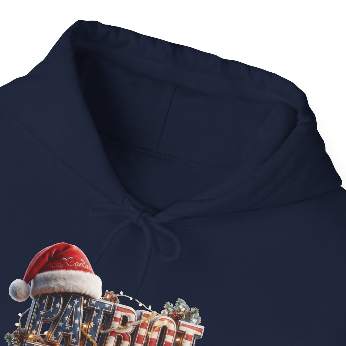 Close-up of a navy blue hoodie with a festive graphic at the lower left showing a red Santa hat and the word 'PATRIOT' in red, white, and blue lettering.