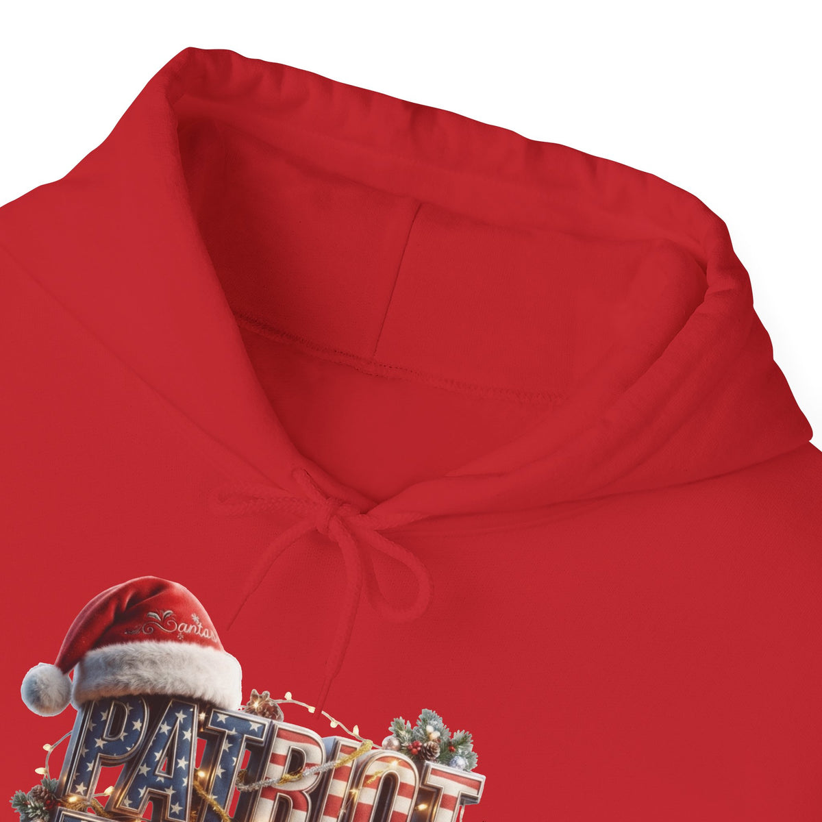 A close-up of a bright red hoodie with a drawstring hood, featuring a festive Christmas-themed graphic on the lower left that reads 'PATRIOT' with a Santa hat and holiday decorations.