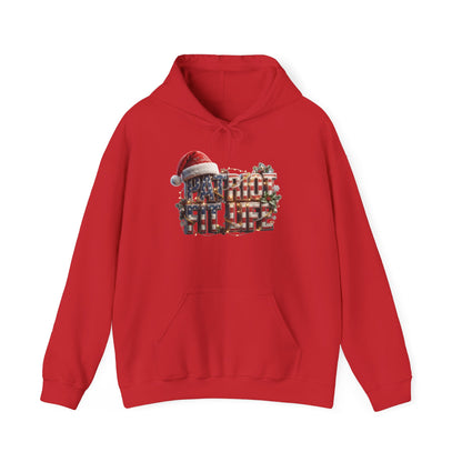 A red pullover hoodie with a festive graphic on the chest featuring the American flag pattern text 'PATRIOT FIT LIFE' with a Santa hat, shown against a plain white background.