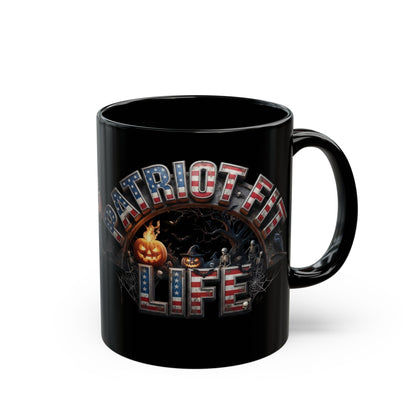 A black ceramic mug with a 'PATRIOT FIT LIFE' Halloween graphic featuring pumpkins, a witch, and a haunted house, set against a plain white background.