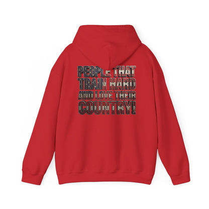 A red pullover hoodie shown from the back, featuring a large graphic text print that reads 'PEOPLE THAT TRAIN HARD AND LOVE THEIR COUNTRY!' on a solid white background.