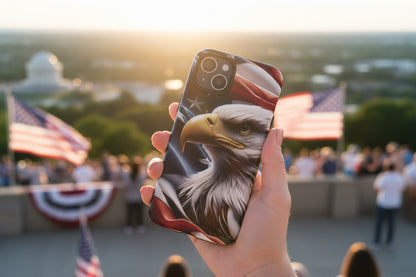 Phone case with eagle and American flag design held in front of a blurred background with American flags.