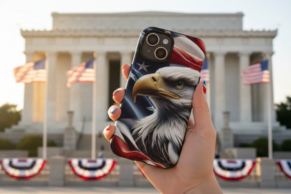 Phone case with an eagle American flag design held in front of the Lincoln Memorial.