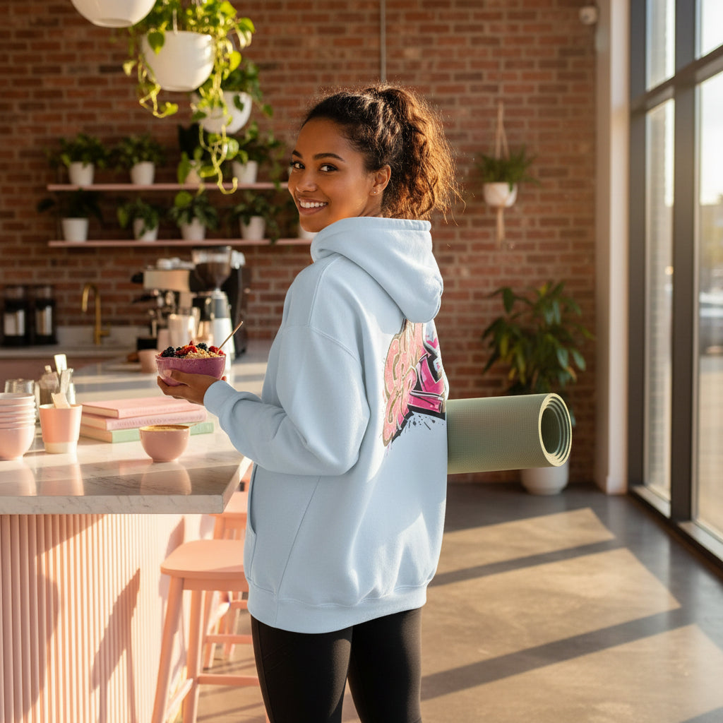 Light blue hoodie with pink 'Gym Girl' text on the back against a background