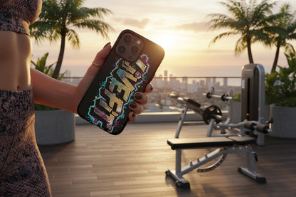 Person holding a phone with a colorful LIVE FIT case in a gym setting with palm trees and sunset.