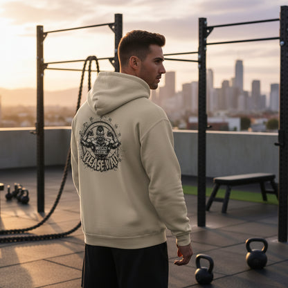 Beige hoodie with graphic design on the back on a beige background.