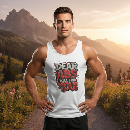 Man wearing a tank top with 'Dear Abs I Will Find You!' text in a mountainous landscape.